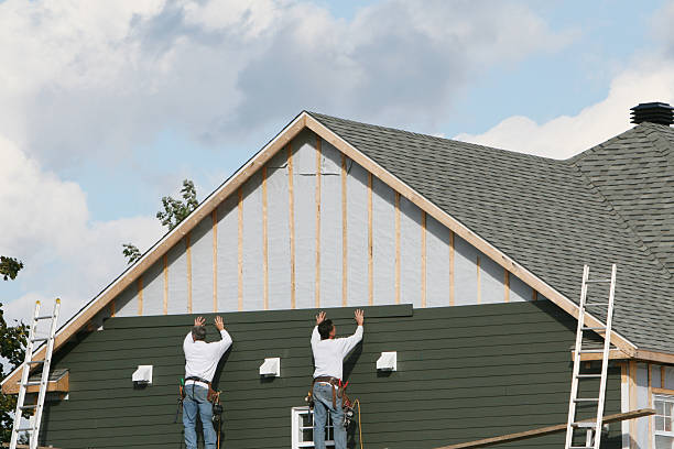 Professional Siding Contractor technician working in Winchester, IN